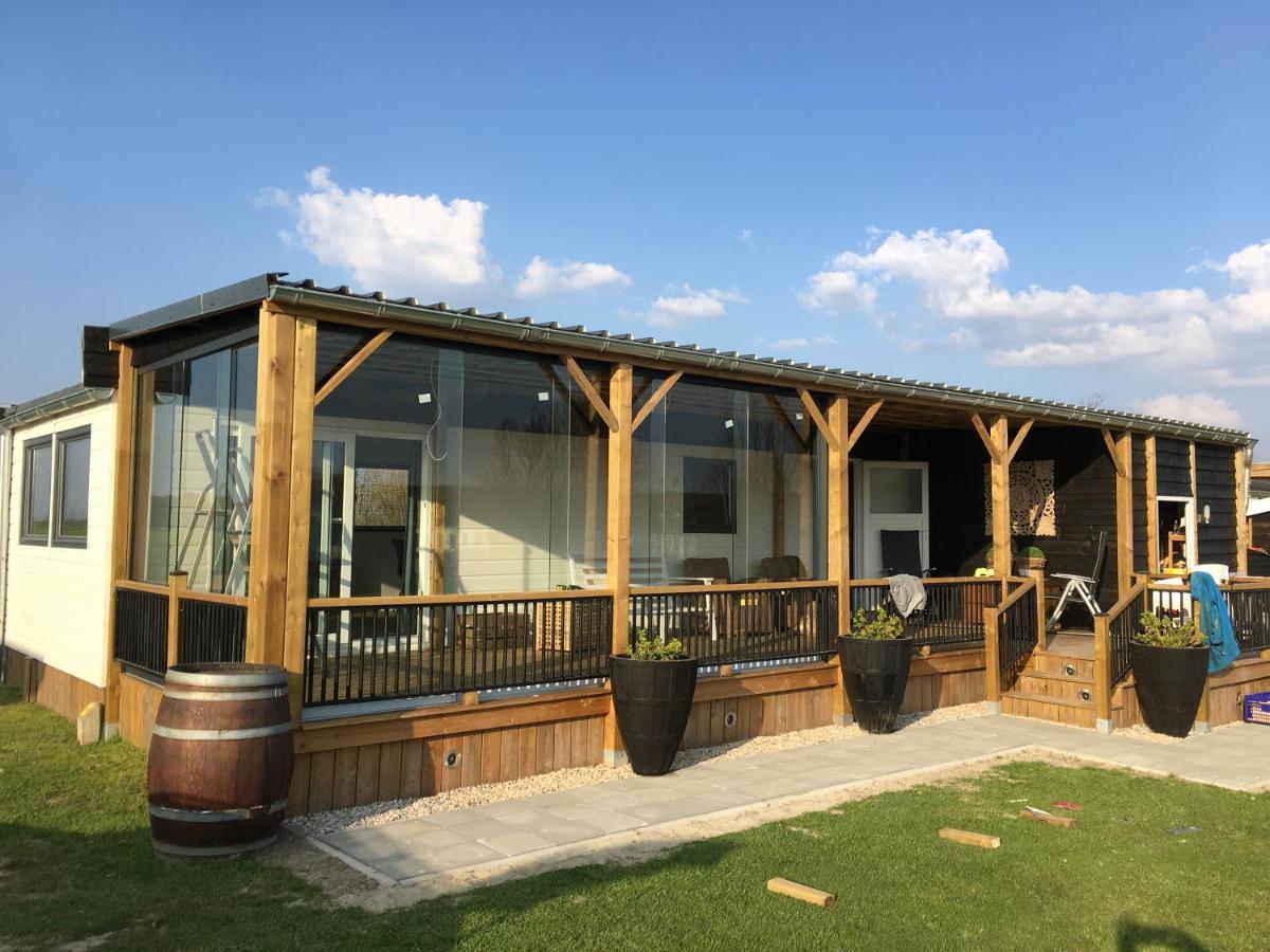 Отель Glamping Aan De Thoolse Kust Poortvliet Экстерьер фото